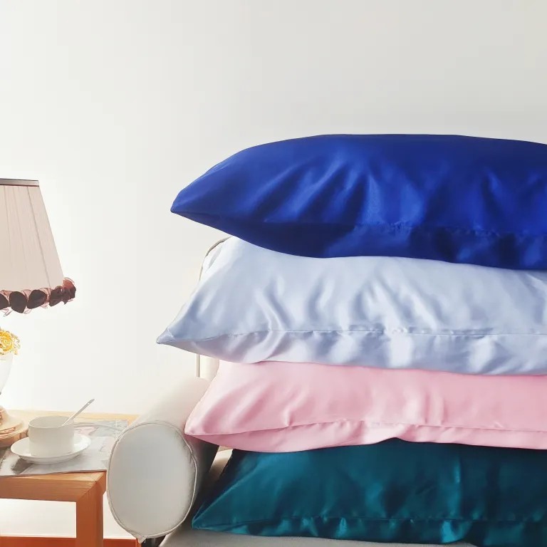 Four satin silk pillowcases in different colors for beauty and home textile products