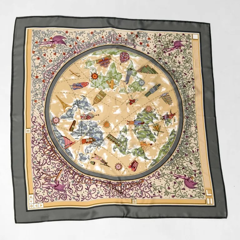 Green silk scarf for women showing elegant foulard styling and print detail