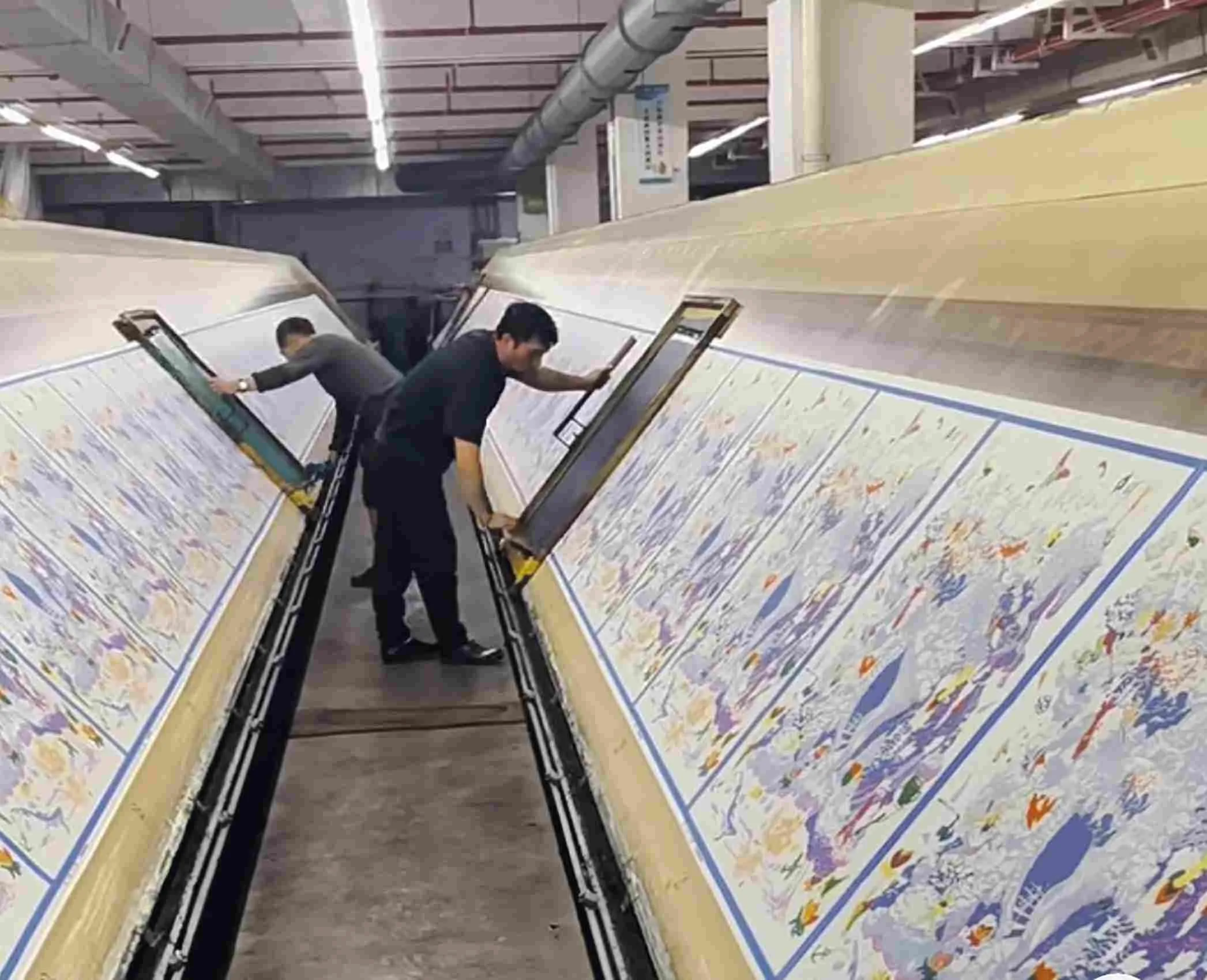 Flatbed screen printing equipment used for custom scarf production