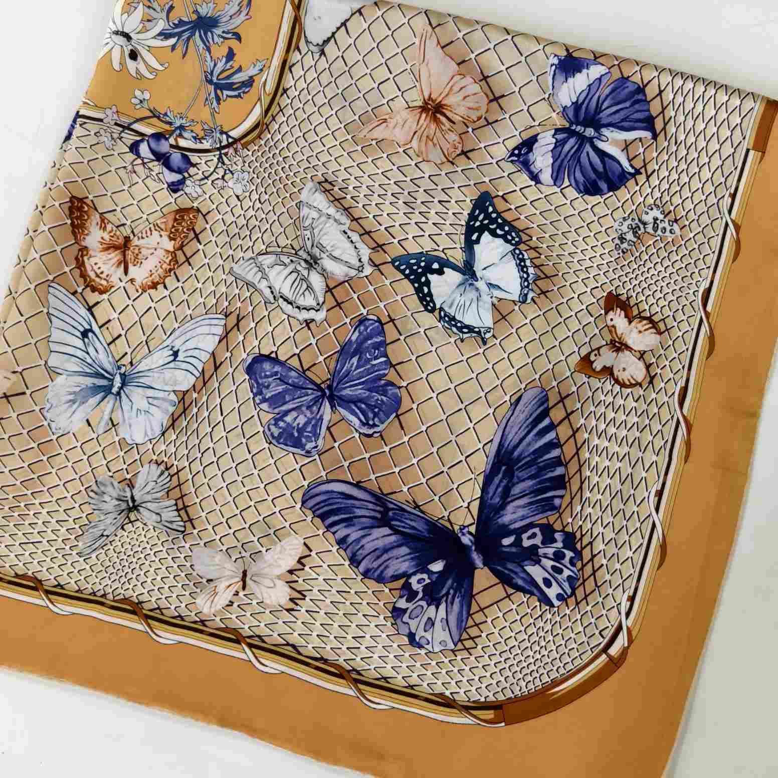 Butterfly print mulberry silk scarf styled as a colorful fashion accessory