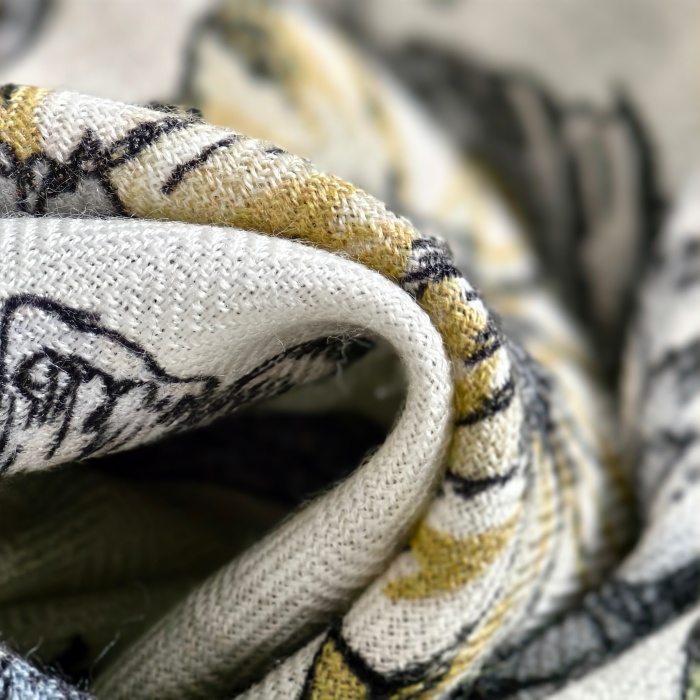Cashmere scarf detail showing soft texture and fine finishing