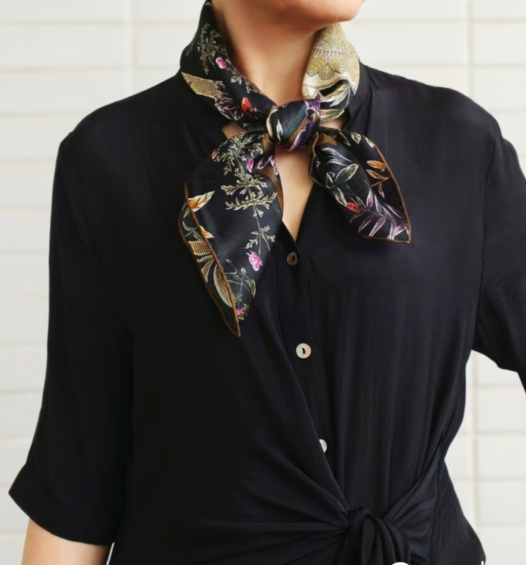 Small mulberry silk scarf worn by woman for custom branded accessory styling