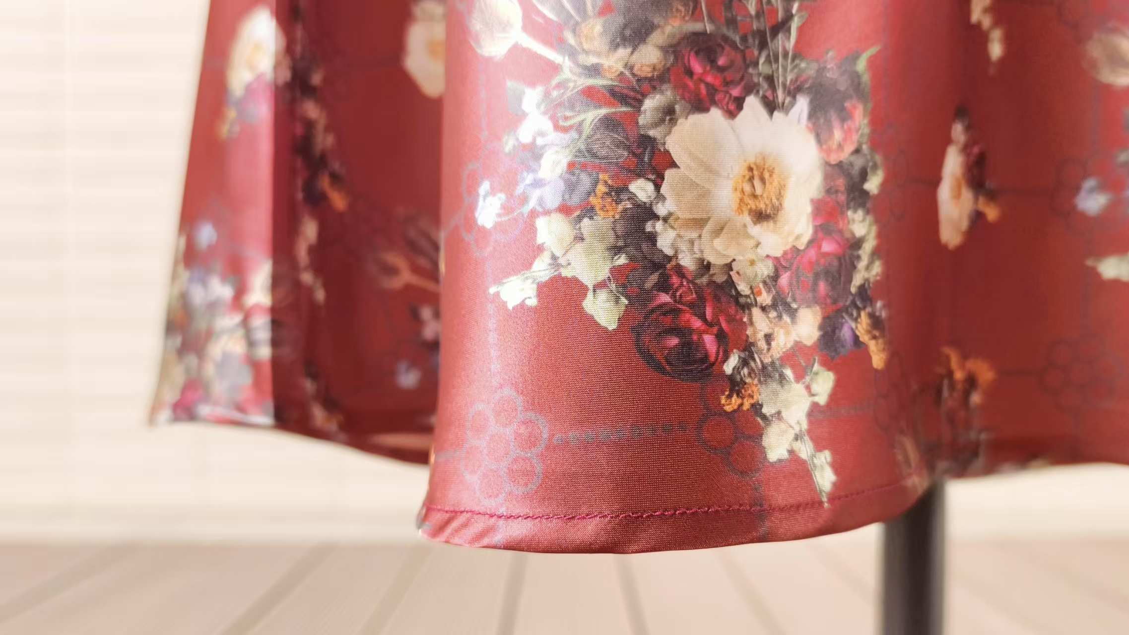 Luxury silk fabric details showing sewing and finishing quality for custom silk apparel