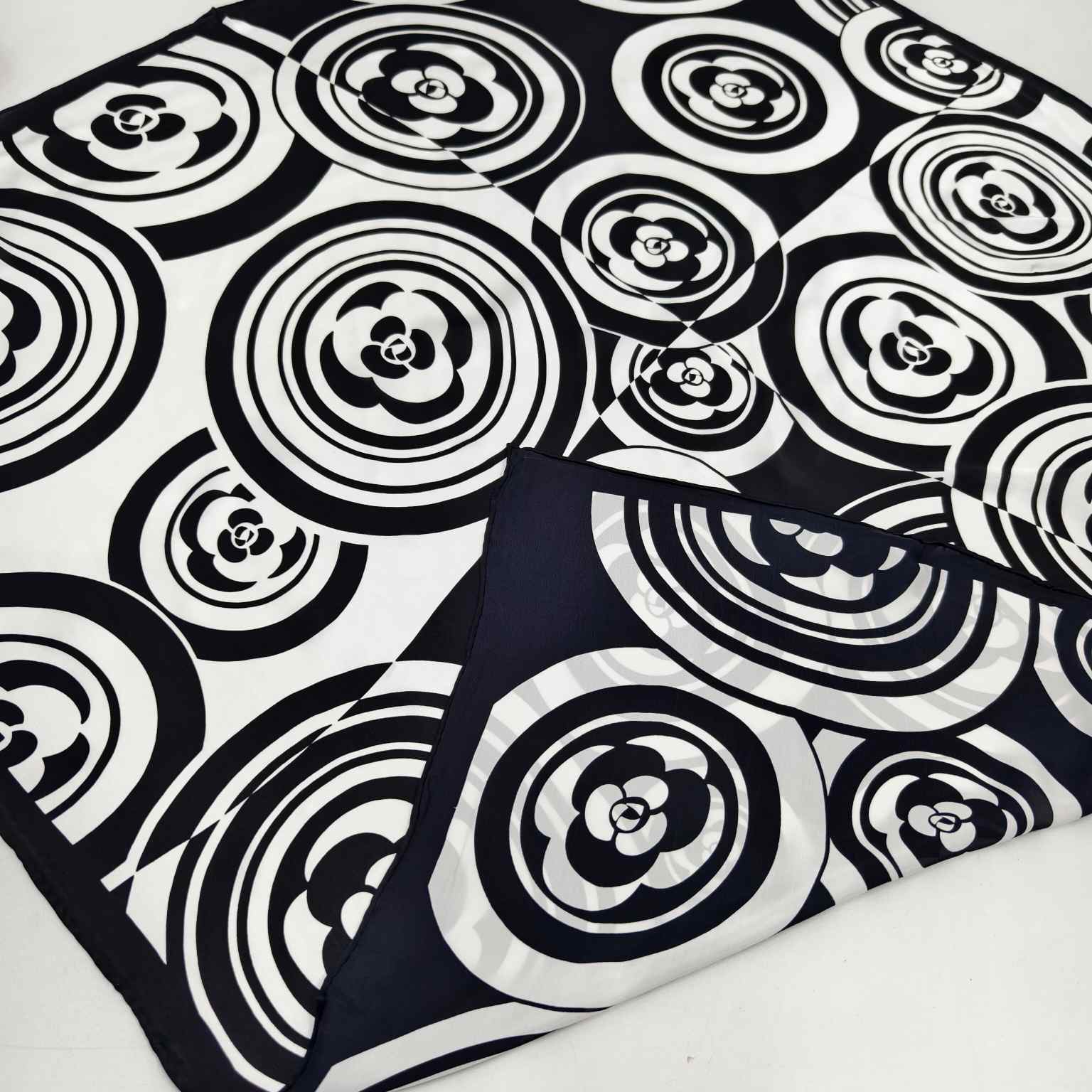 Mulberry silk scarf detail showing fabric surface, print quality, and finishing for wholesale sourcing