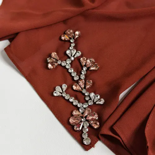 Brick red chiffon scarf with rhinestone detail