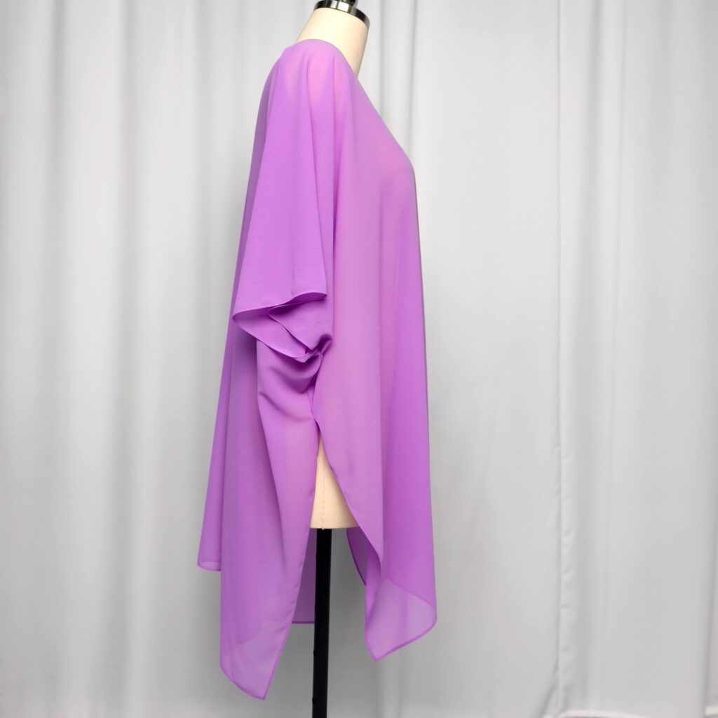 A side view of a purple chiffon kimono, showing loose sleeves, a flowing hem, and a lightweight breathable cover-up effect.