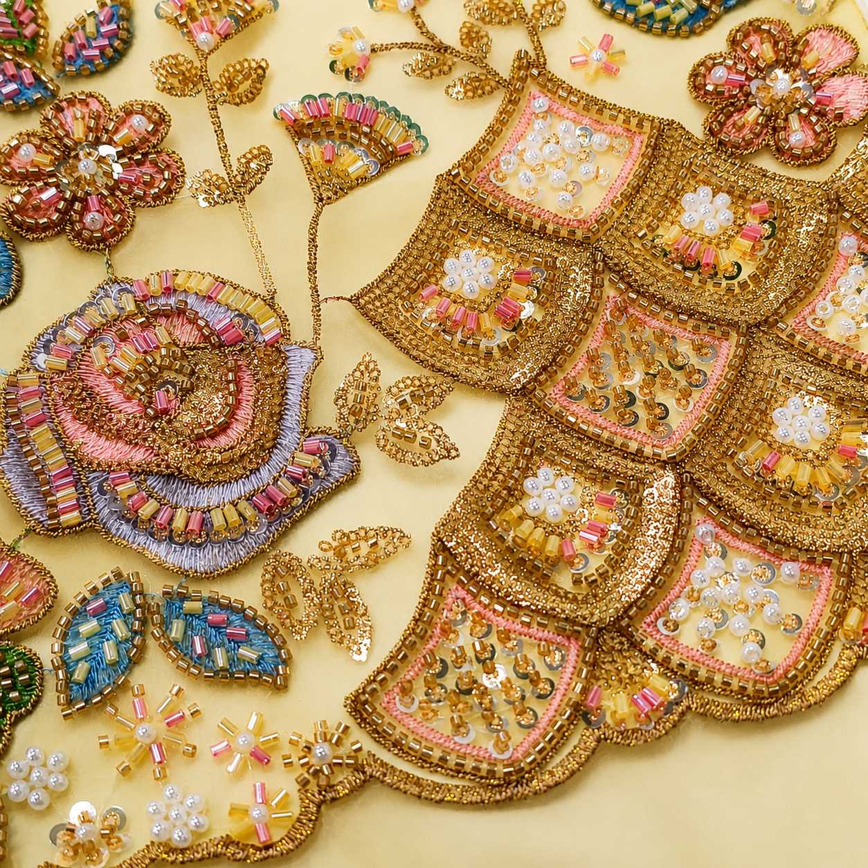 Bead embroidery detail for a luxury custom scarf