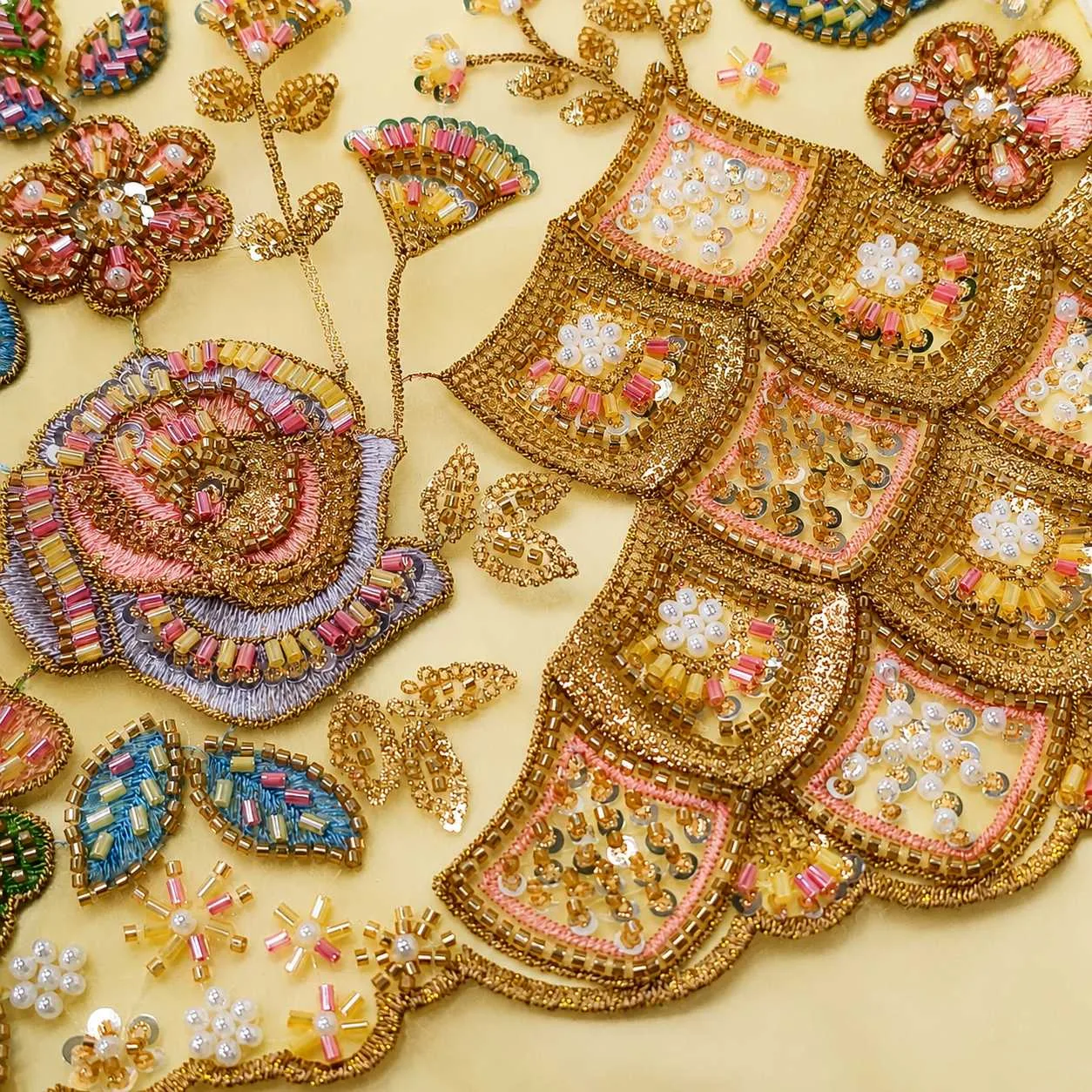 Bead embroidery detail for a luxury custom scarf