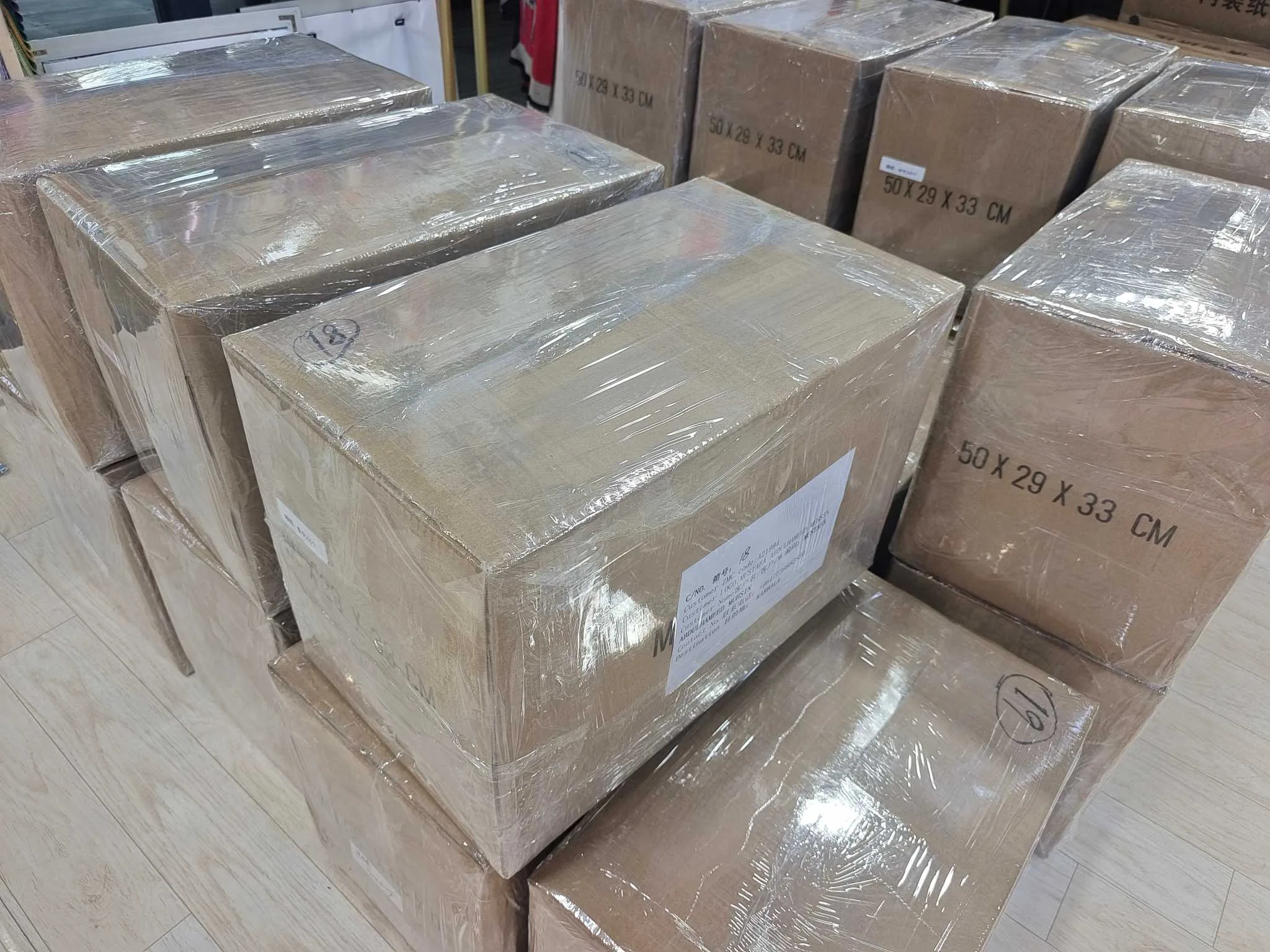 International bulk shipment of custom scarves prepared for delivery