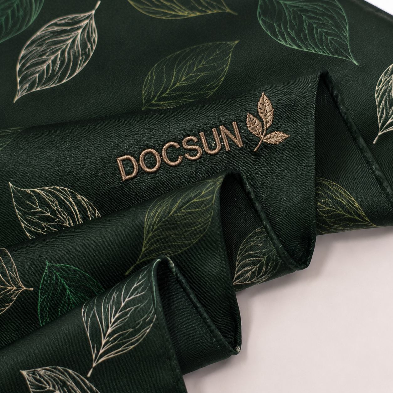 Custom embroidered logo applied to a branded scarf
