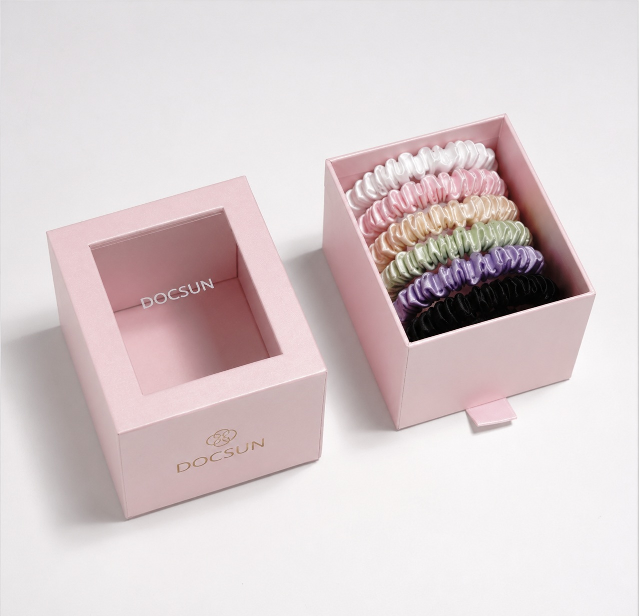 Pink custom packaging design for silk scrunchie retail and gifting programs