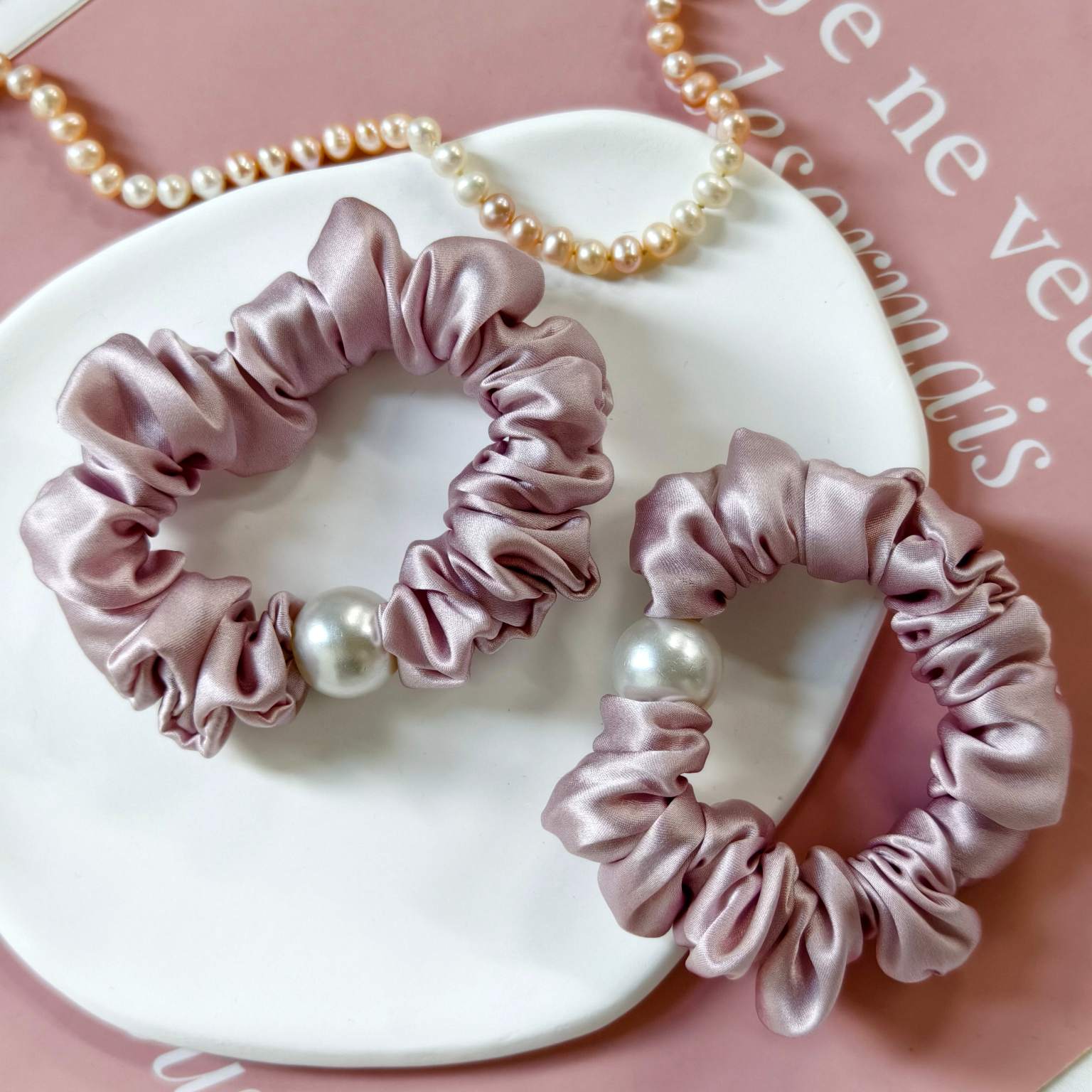 Dusty pink pearl embellished luxury silk scrunchies with hand sewn decorative detail