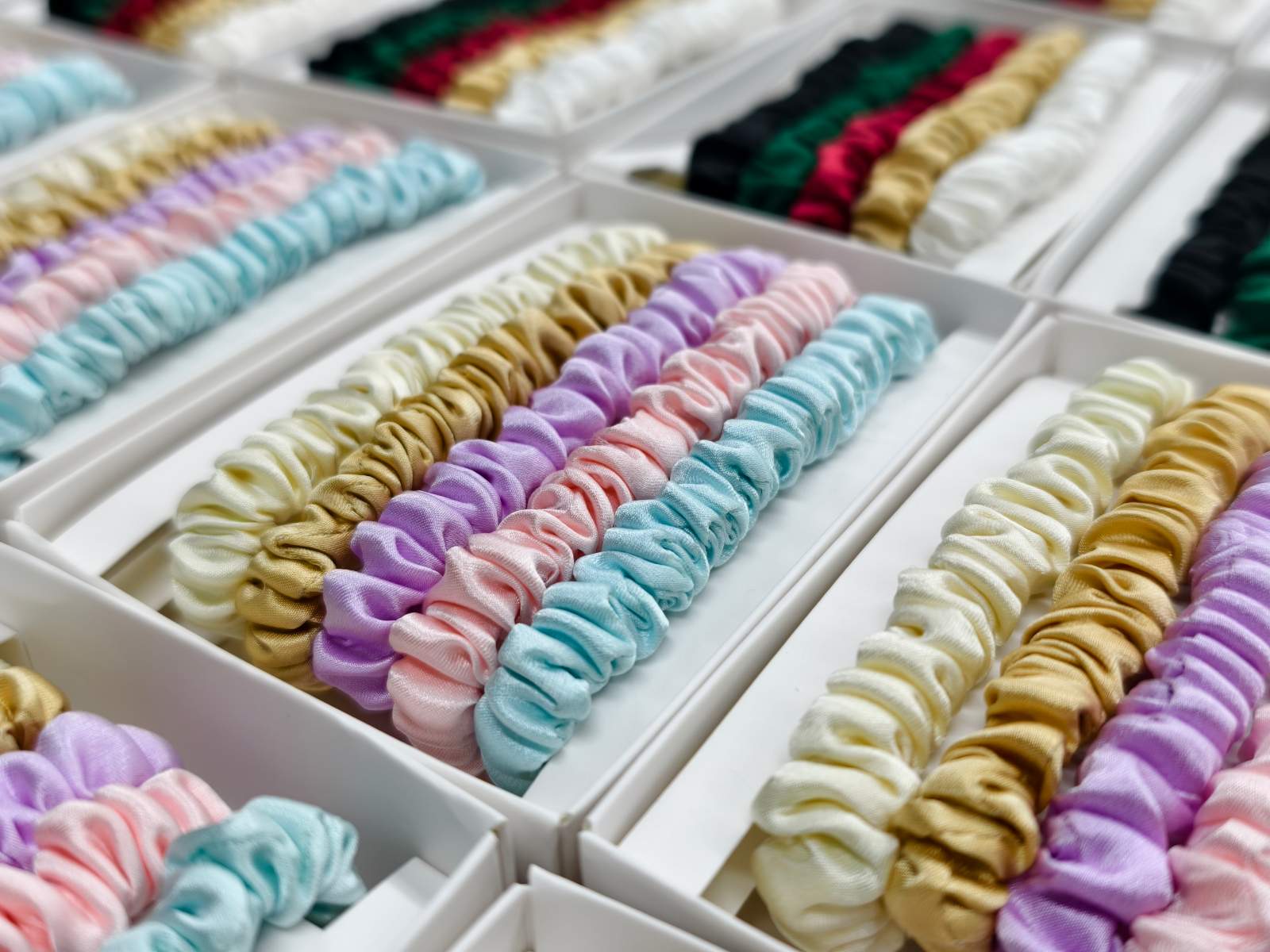 Expert craftsmanship at DOCSUN silk factory for custom scrunchies and hair accessories