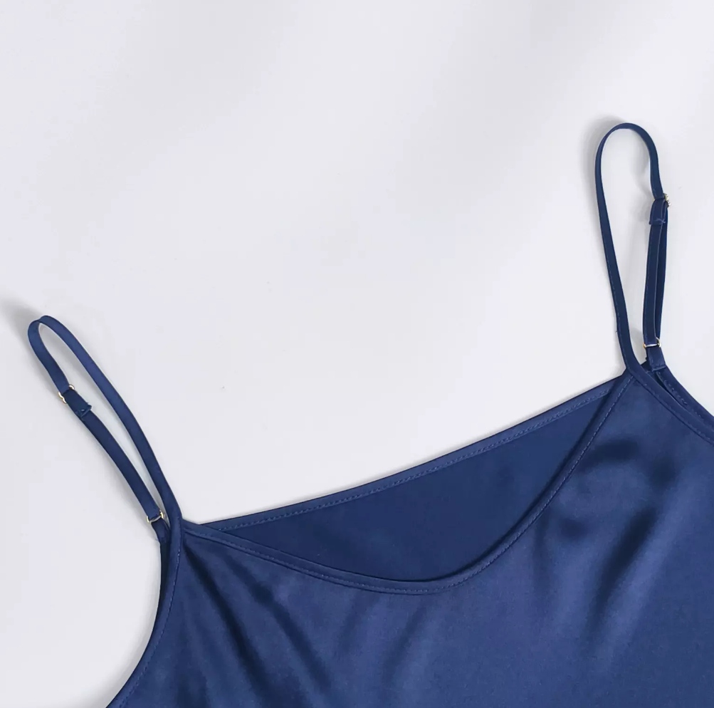 Close-up of exquisite workmanship on custom silk apparel