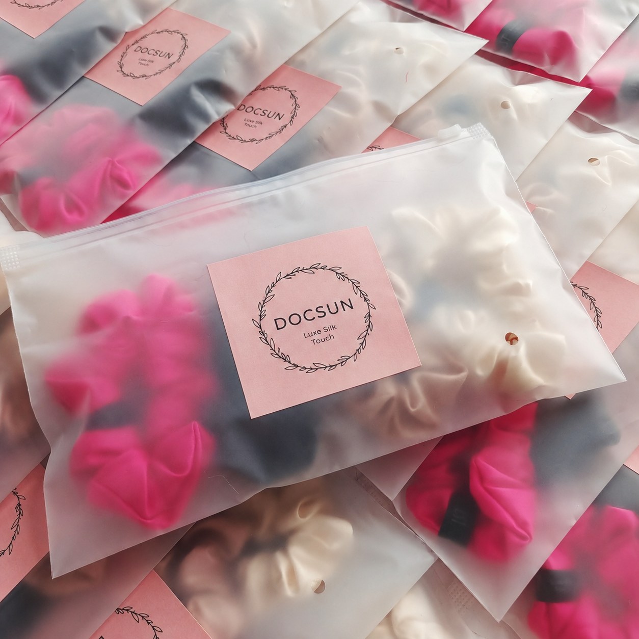 Frosted pouch packaging for a private label mulberry silk scrunchie