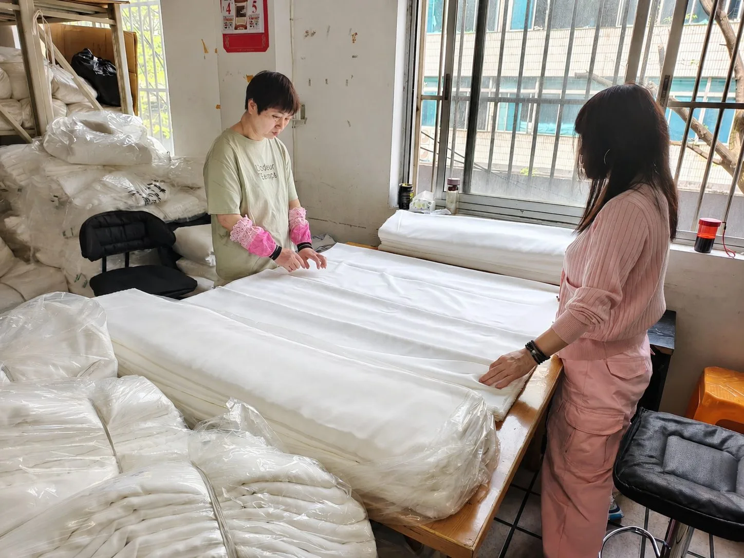Silk fabric inspection before custom scarf production