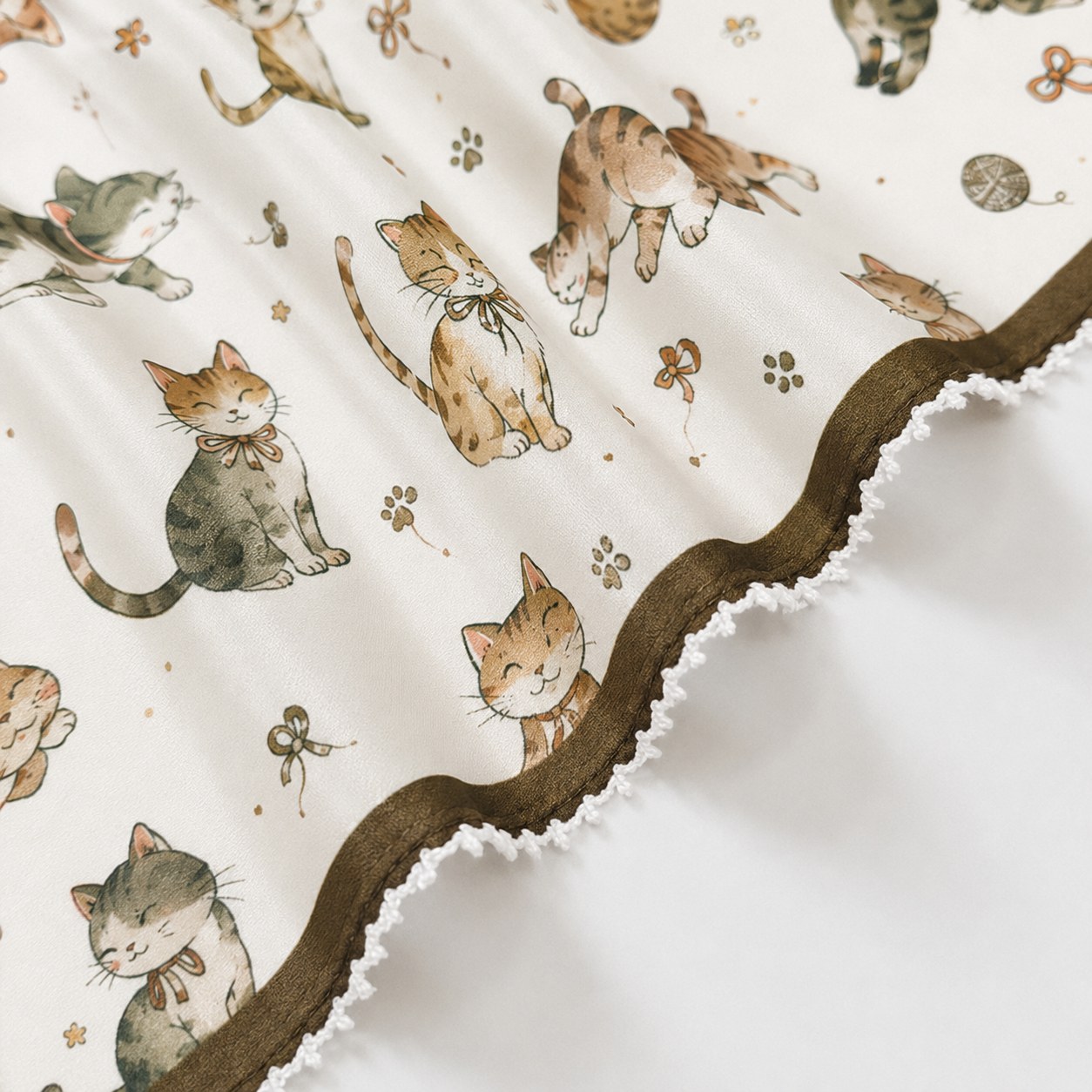 Kitten printed mulberry silk scarf styled as a women's neck scarf