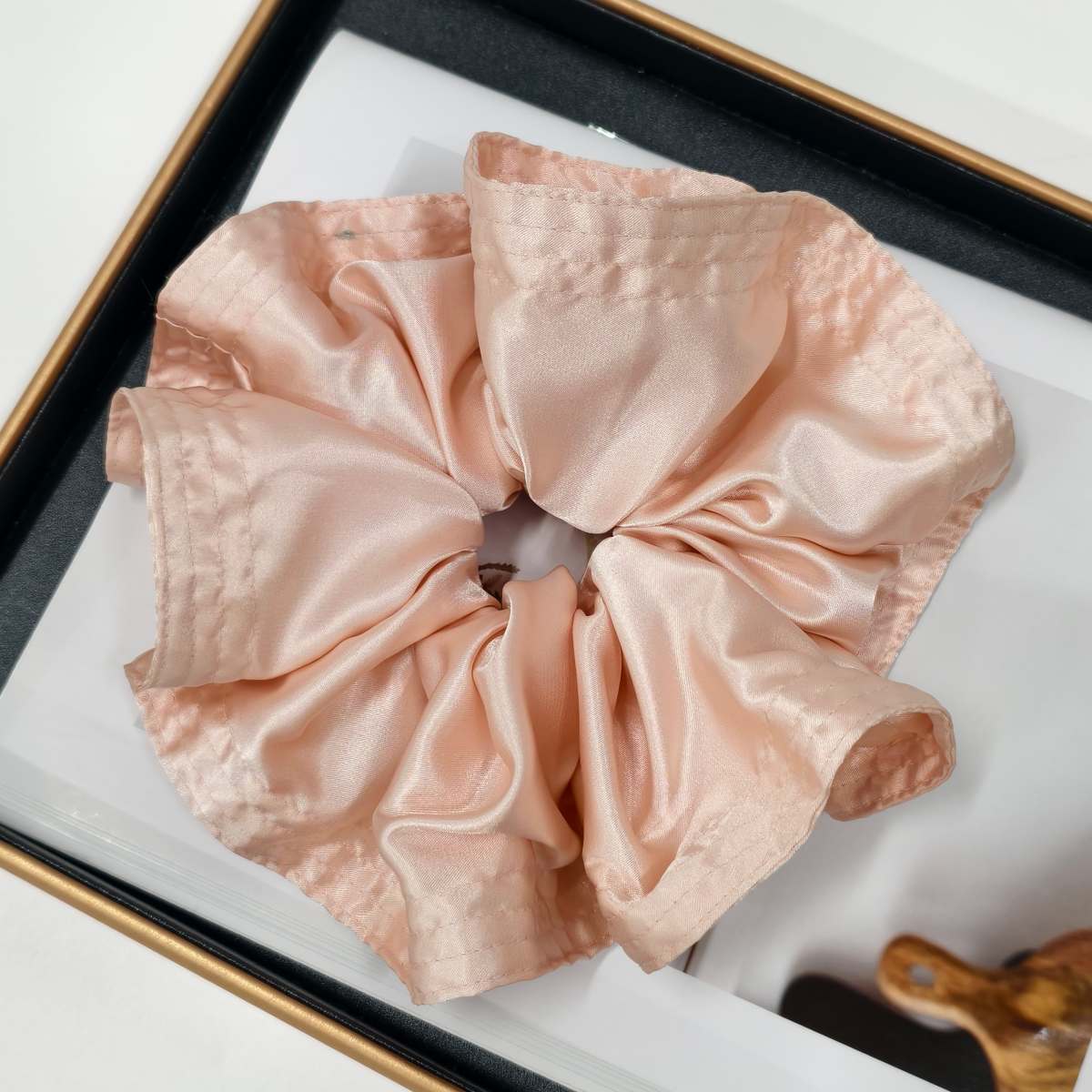 Oversized silk hair scrunchies for statement fashion accessory programs