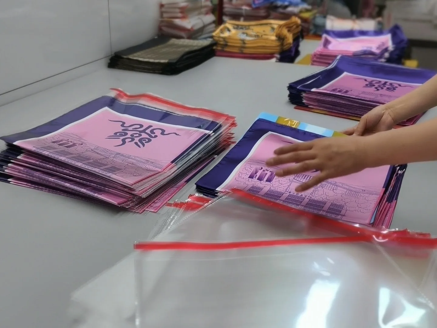 Individual transparent bag packaging process for custom silk scarves