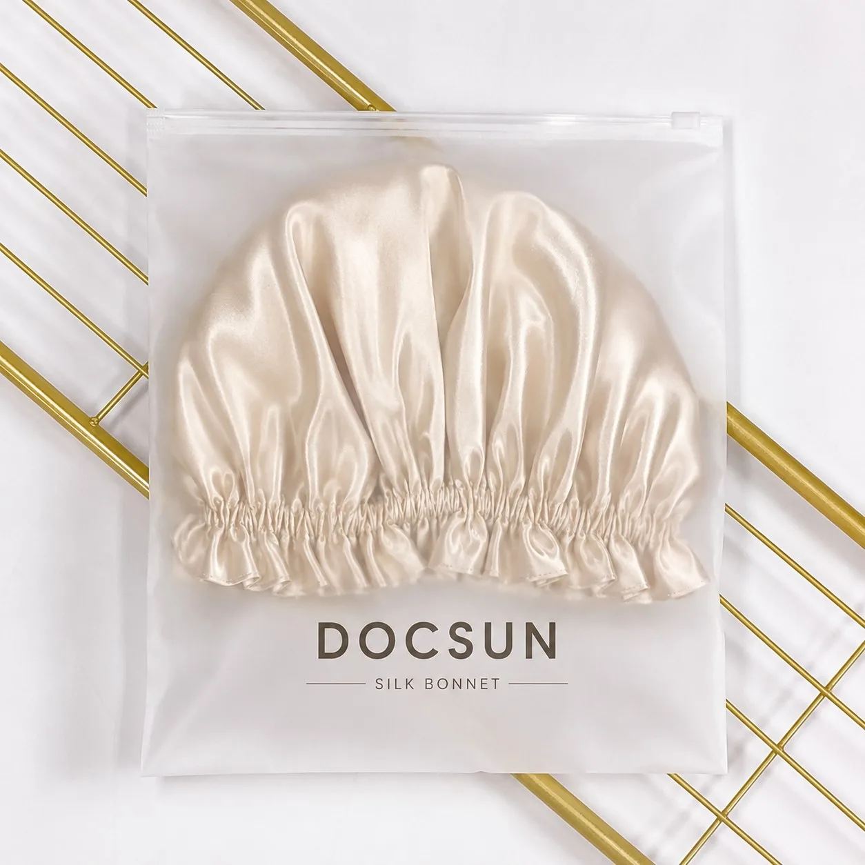 Silk bonnet packed in a frosted or transparent retail bag