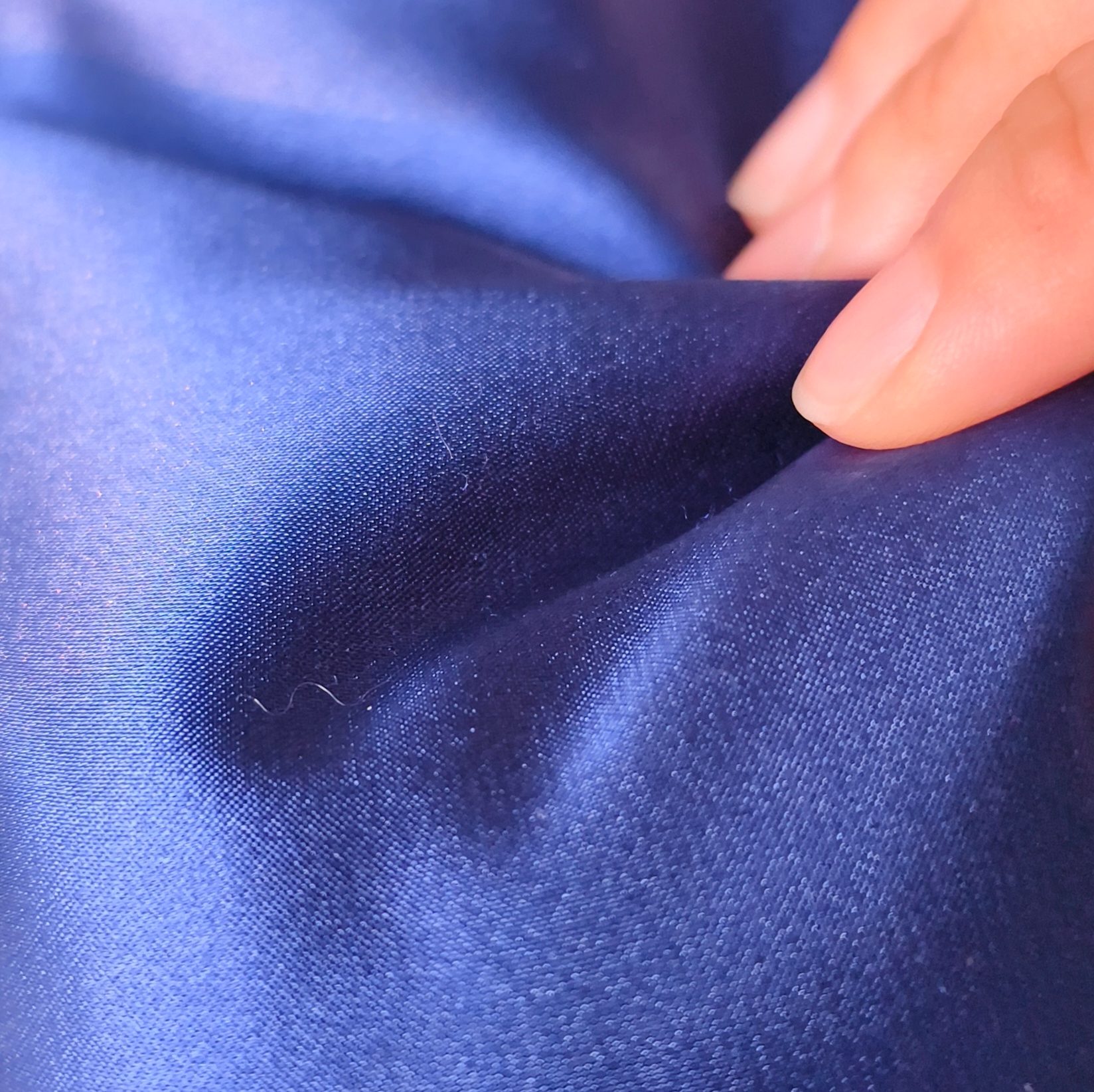 Blue silk fabric sample for visual luster and hand feel review