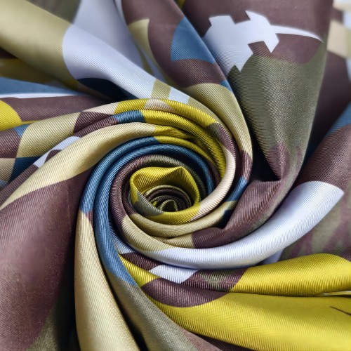Silk scarf detail showing fabric, print, and edge quality