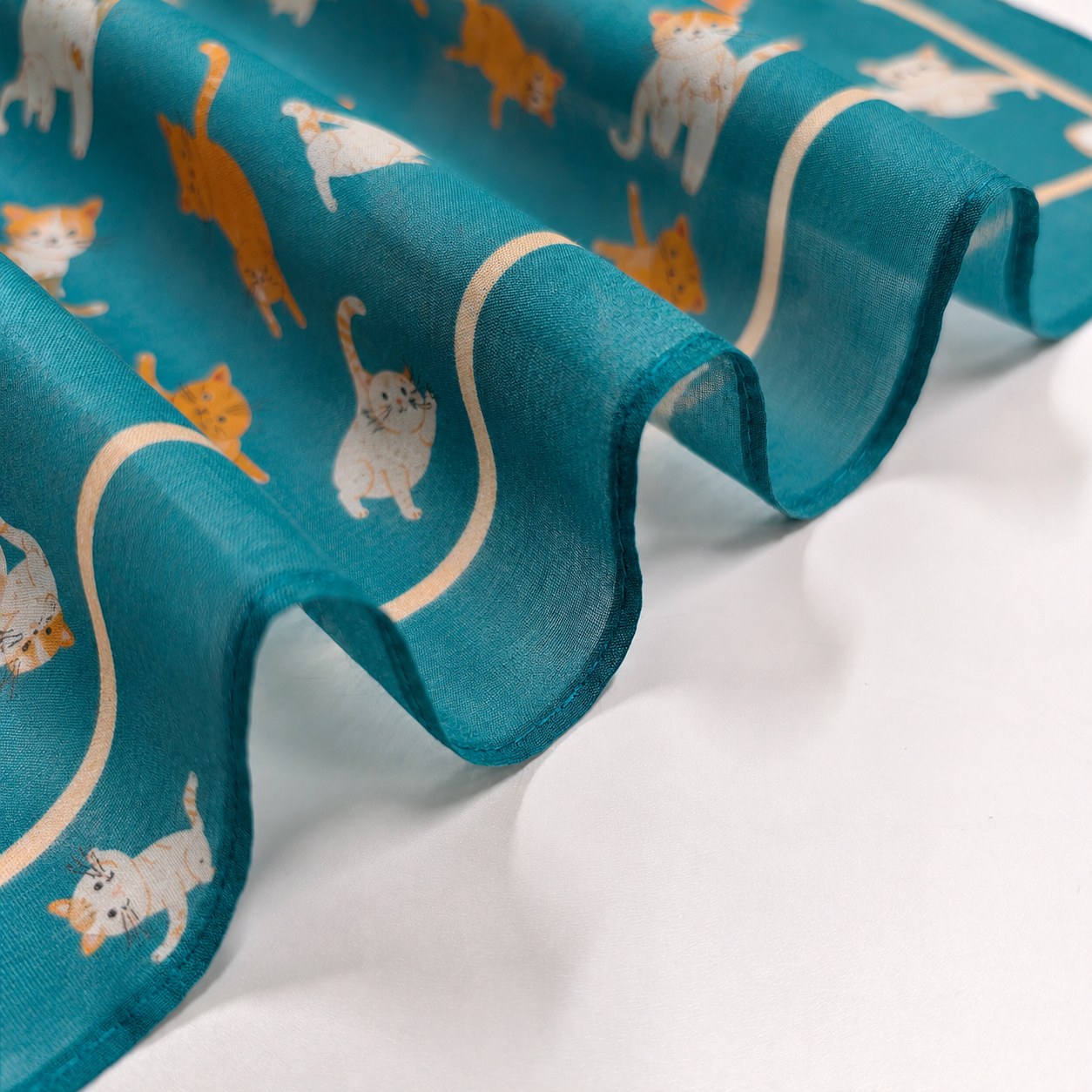 Subtle natural sheen of 30 percent silk and 70 percent cotton scarf fabric