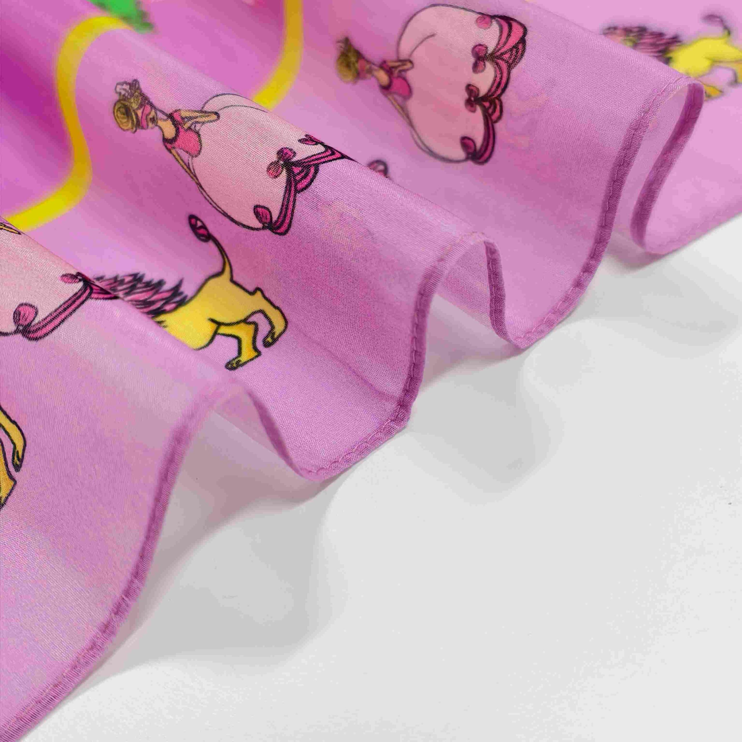 Fine machine-rolled hem on a custom cotton and silk-cotton scarf