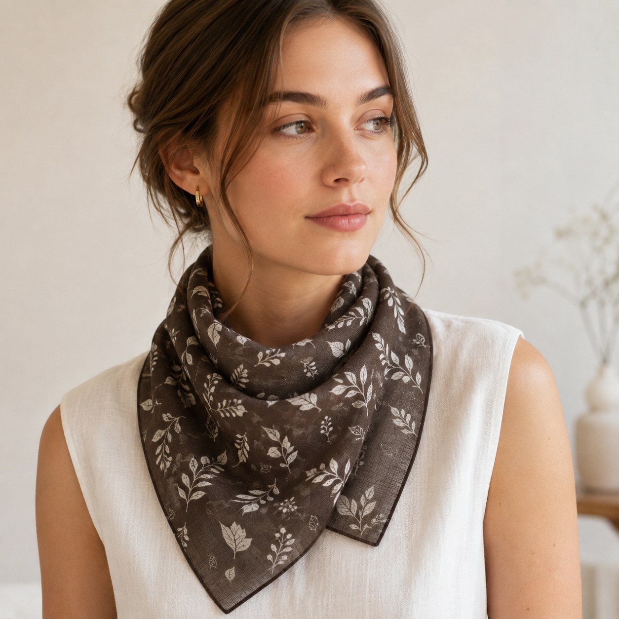 Model styling a breathable ramie-cotton neck scarf